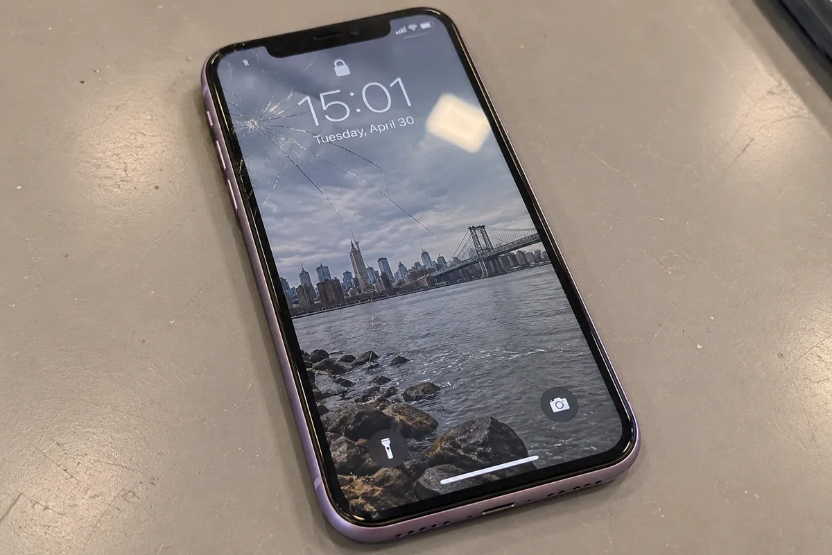 iPhone 11 showing glass damage before a general repair assessment